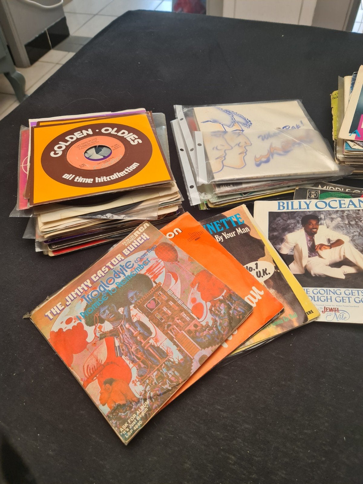 lot singels, Cd's en Dvd's, Ophalen