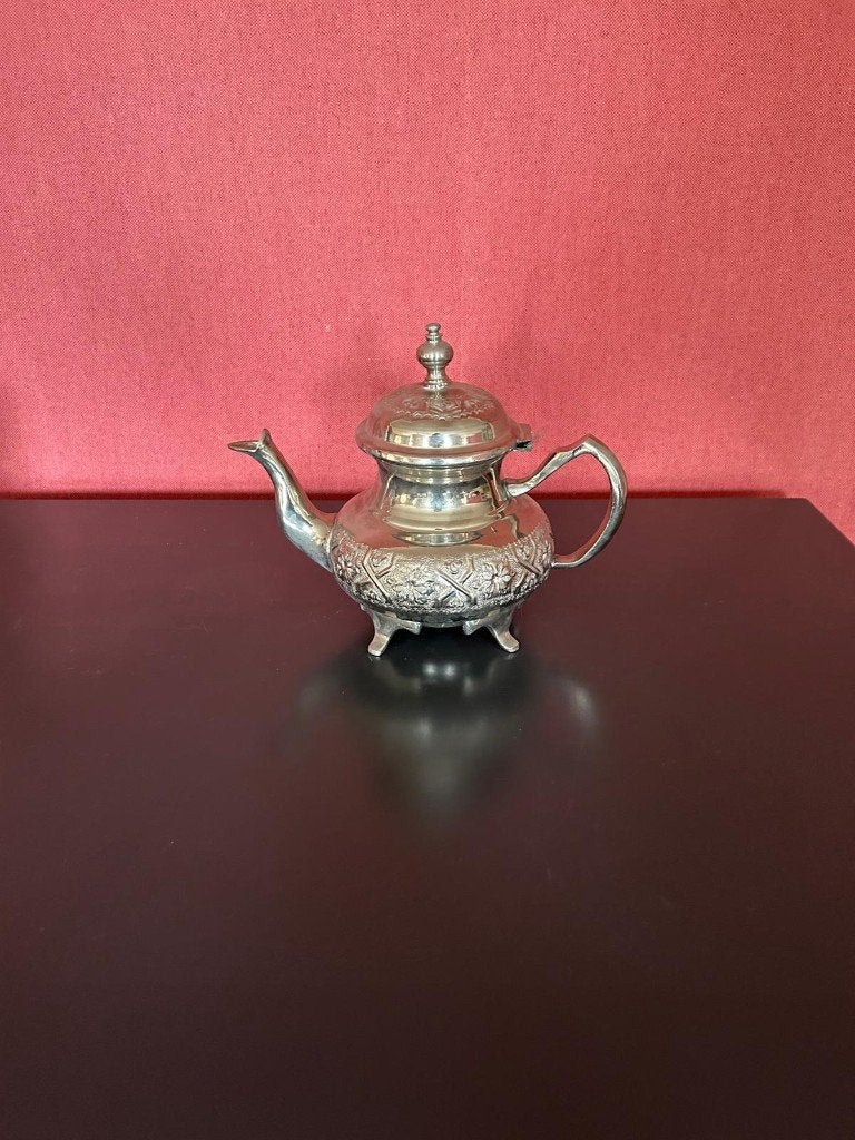 Zilveren theepot, Enlèvement