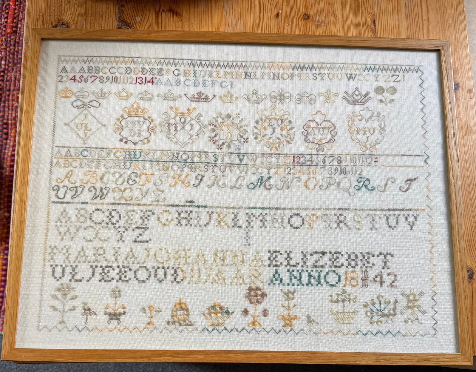 Abcédaire en point de croix encadré, Enlèvement