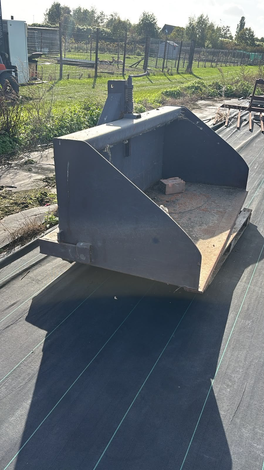 Grondbak schepbak, Ophalen