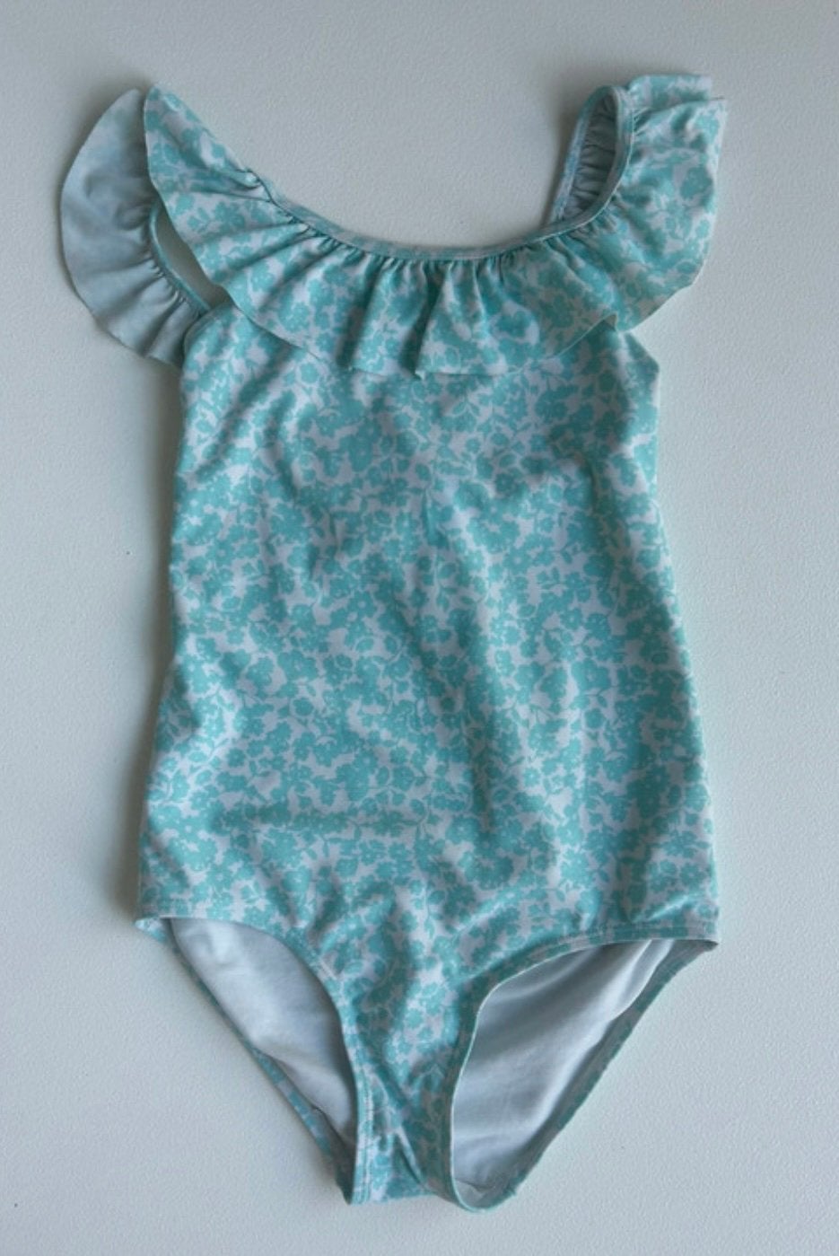 Lichtblauw badpak - H&M - mt 122, Kinderen en Baby's, Ophalen of Verzenden, Zo goed als nieuw, Meisje, Sport- of Zwemkleding