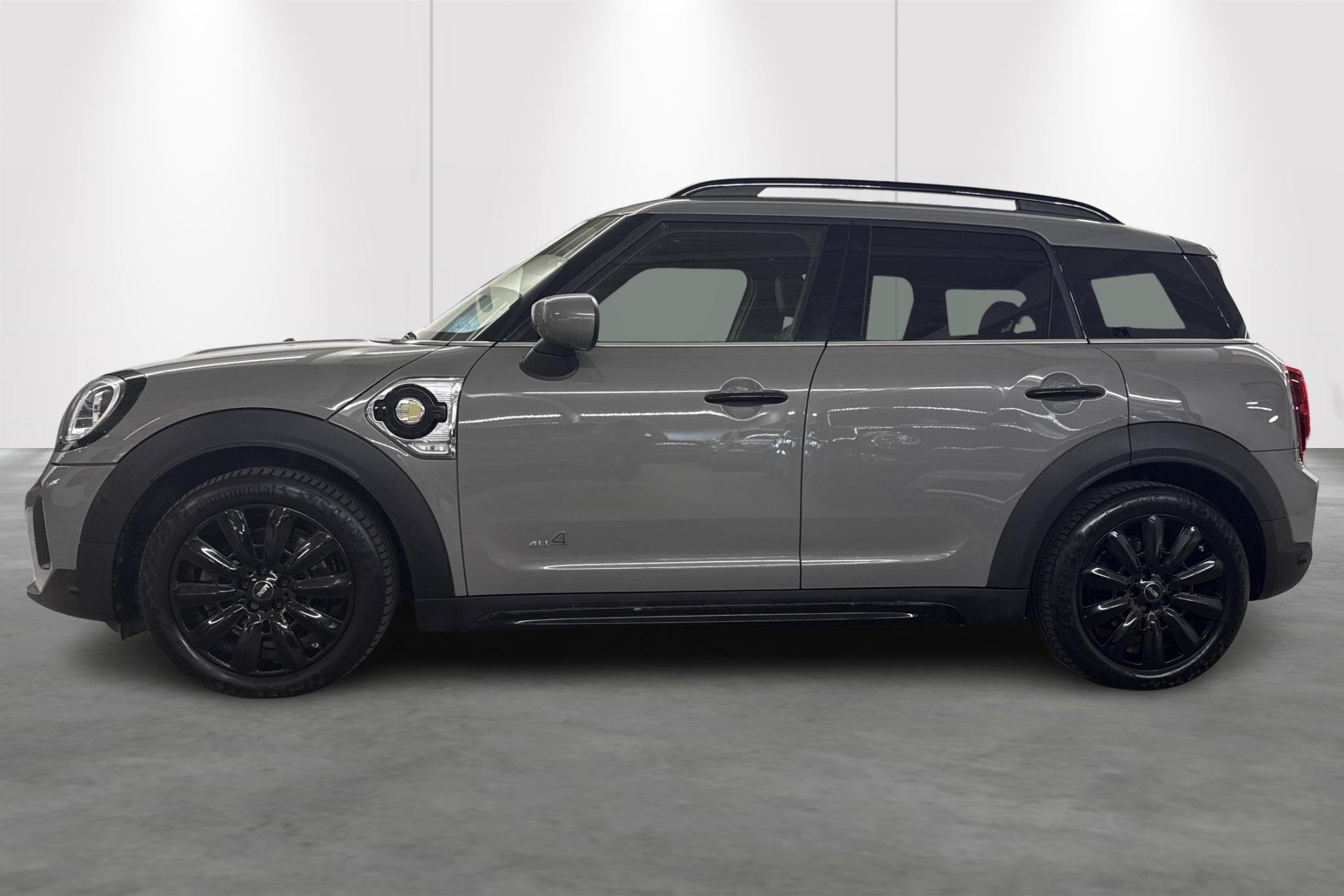 Mini Countryman Cooper S E ALL4 AT, Auto's, Automaat, Stof, Gebruikt, Zwart