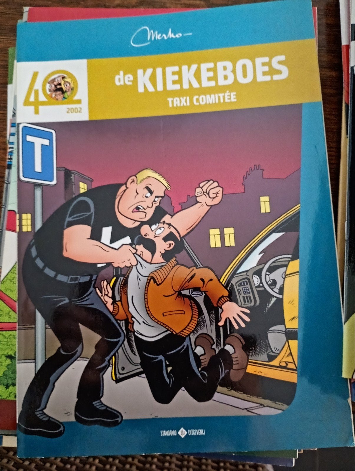 De kiekeboes Taxi comite, Boeken, Ophalen