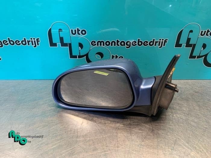 Buitenspiegel links van een Chevrolet Lacetti (Lacetti 03-), Gebruikt, -, Ophalen of Verzenden, -