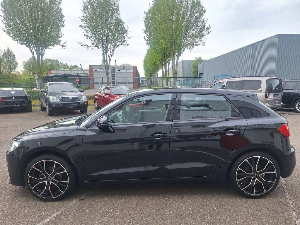 Audi A1 Sportback 25 TFSI Attraction Carplay/Android/Cruise, Auto's, Stof, Euro 6, 95 pk, Zwart