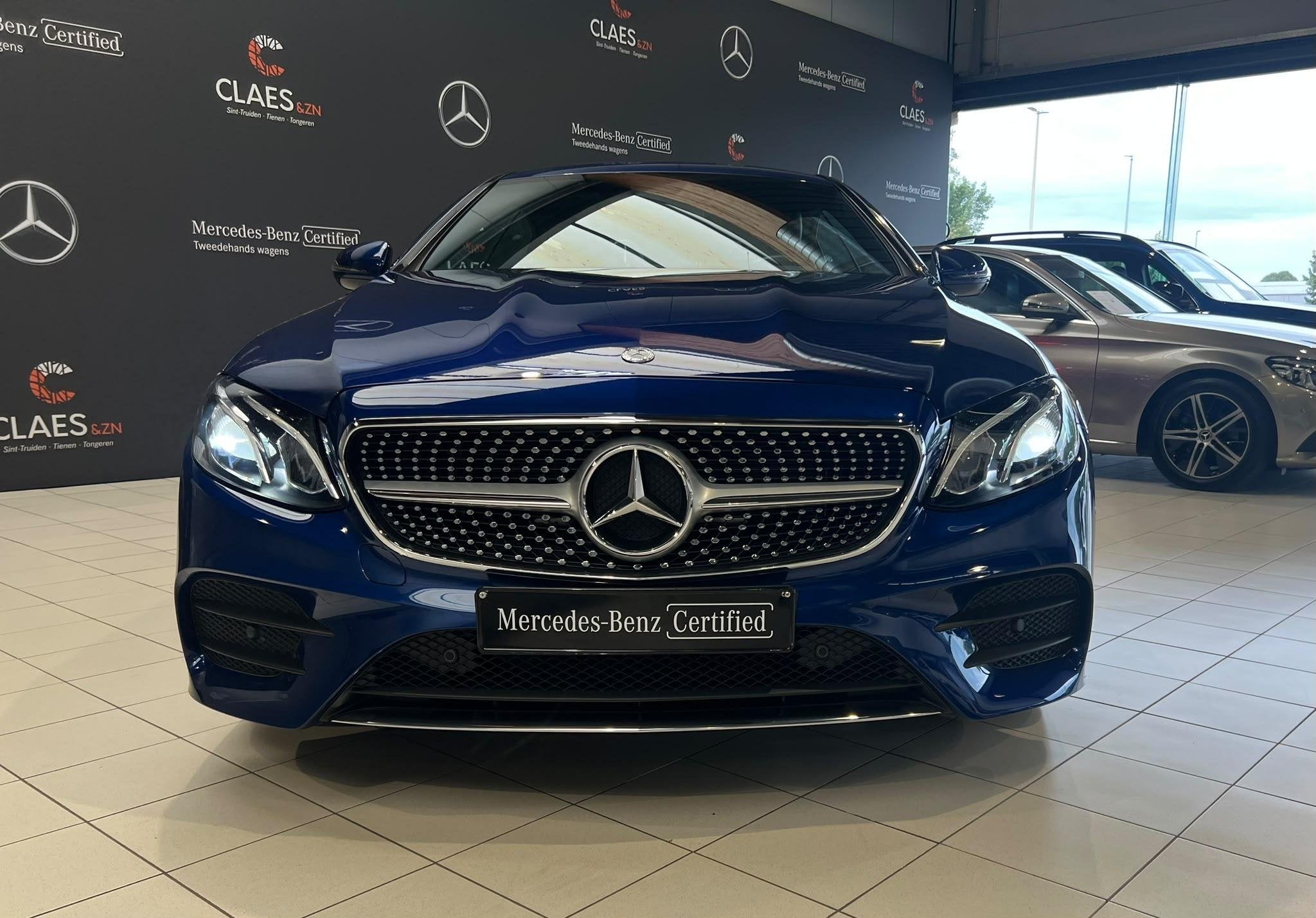 Mercedes-Benz E-Klasse Coupé E 200 AMG LINE DOSSIER 8975, Auto's, Automaat, 4 cilinders, Blauw, Bedrijf