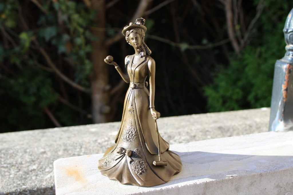 clochette de table en bronze signé, femme au cricket ., Antiquités & Art, Enlèvement ou Envoi, Bronze