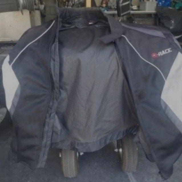 Te koop een nette en sportieve textiele motorjas, Ophalen