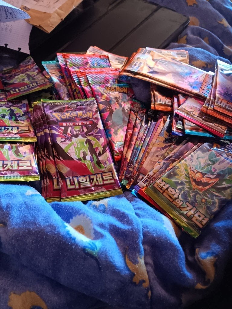 Lot van 106 Japanse en Koreaanse booster packs., Ophalen of Verzenden, Nieuw, Booster
