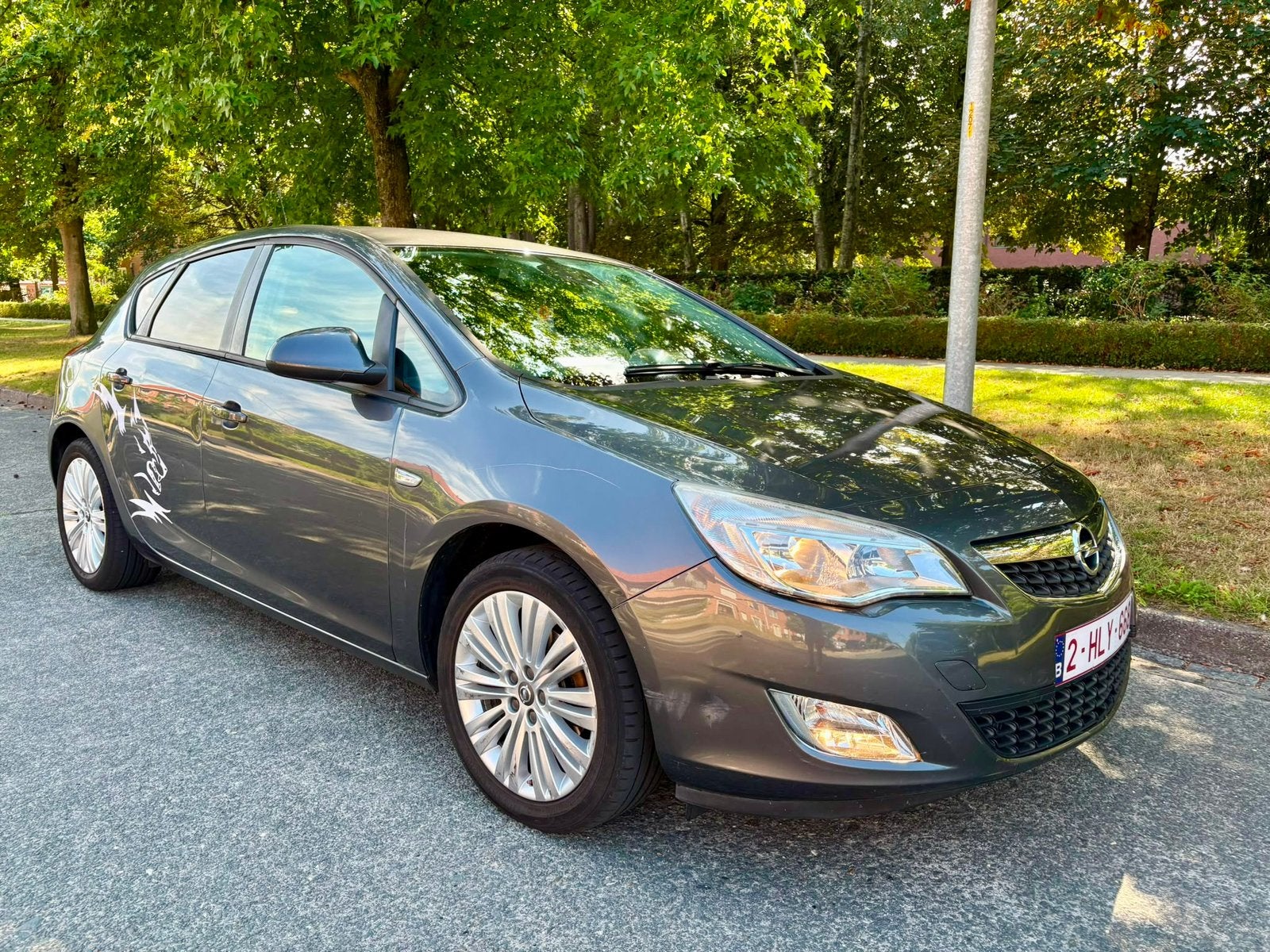 Opel Astra 1.4 Benzine 2011, Auto's, Opel, Euro 5, Sound system, 4 cilinders, 74 kW