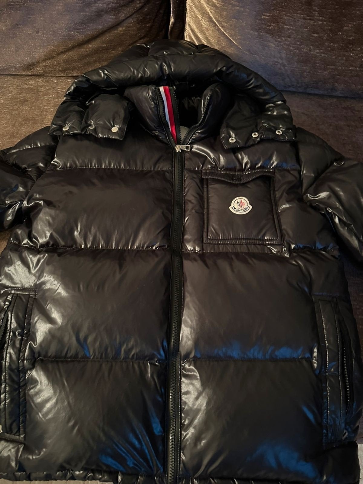 Moncler jas, Ophalen