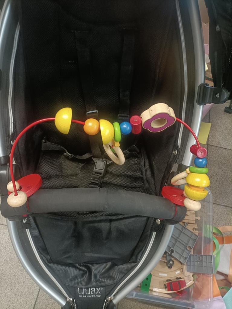 Kinderwagenspeeltje, Ophalen
