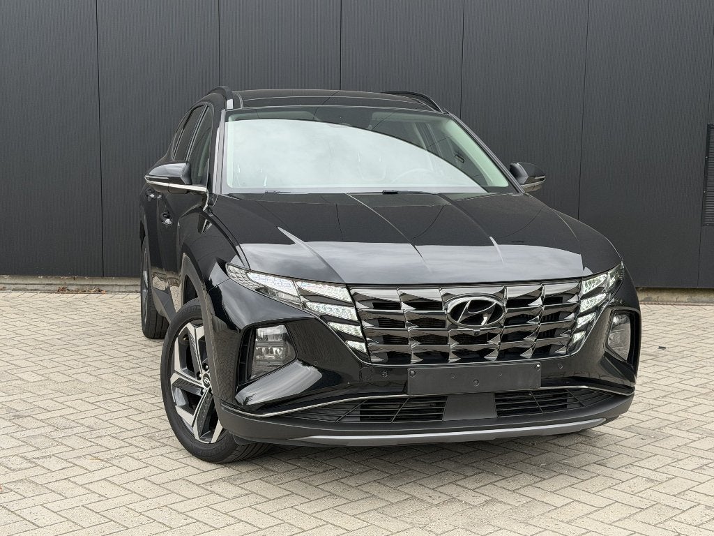Hyundai Tucson 1.6T-GDi HEV Premium Automaat|Pano|Leder|360, 4 cilinders, Adaptive Cruise Control, Zwart, Leder