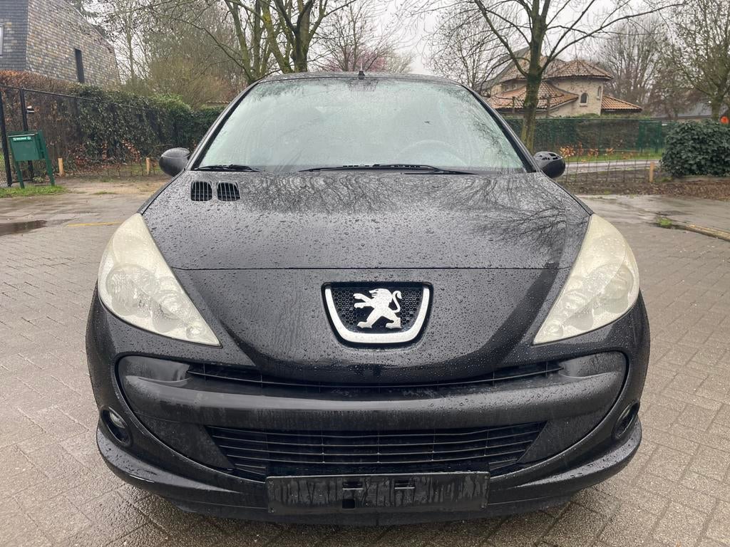 Peugeot 206+ 1.4 benzine bouwjaar 2011 met airco, Auto's, Peugeot, Stof, 139 g/km, Zwart, Zwart
