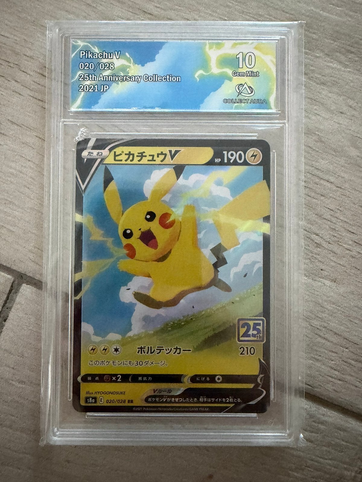 Verzamel Aura Pokemon Pikachu V-kaart met een score van 10, Ophalen of Verzenden, Zo goed als nieuw