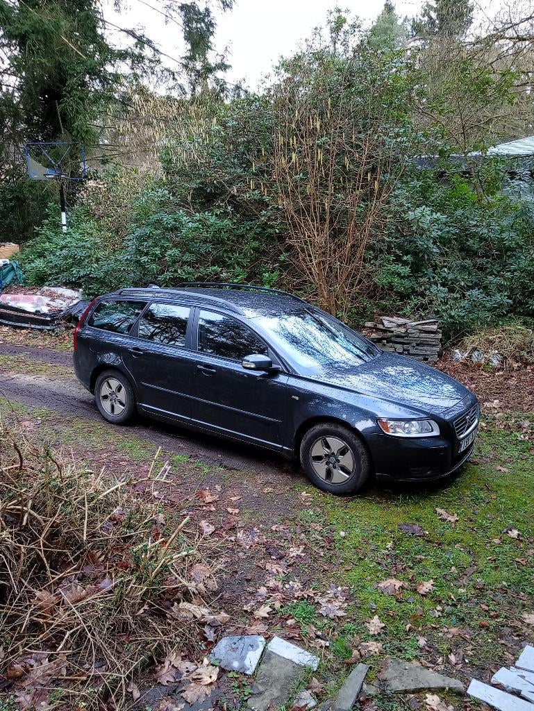 Volvo V50 2009, Auto's, Euro 5, Zwart, Blauw, Leder en Stof