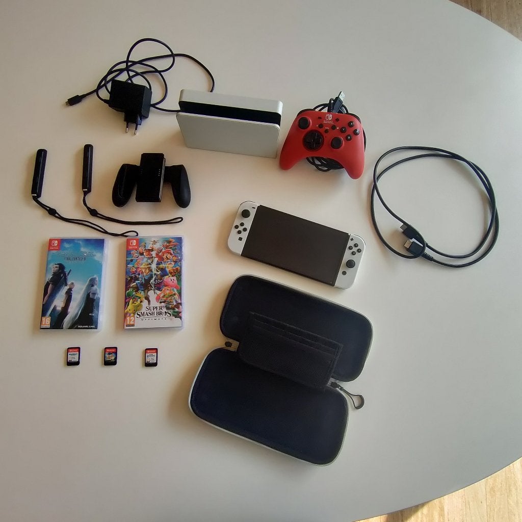 Nintendo Switch Oled avec jeu au choix et suppléments, Switch OLED, Enlèvement ou Envoi, Avec 1 manette, Utilisé