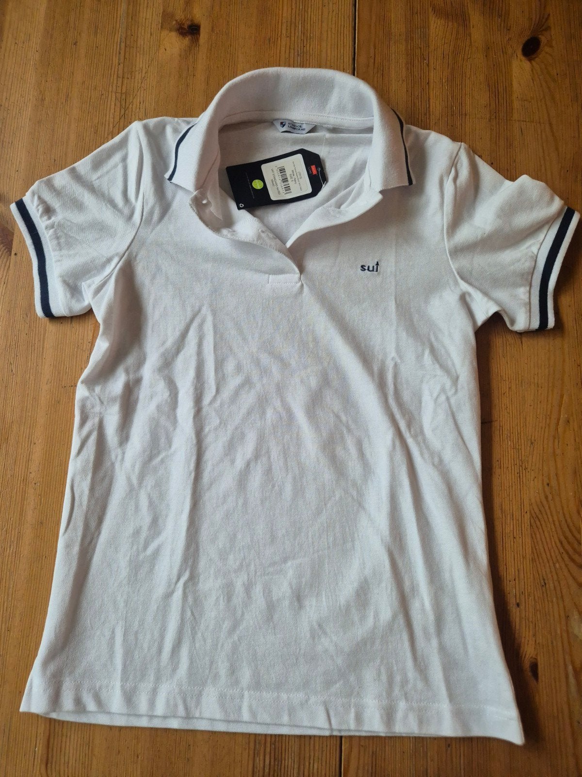 Nieuwe polo T-shirt uniform SUI maat S, Kleding | Dames, Ophalen of Verzenden, Maat 36 (S)