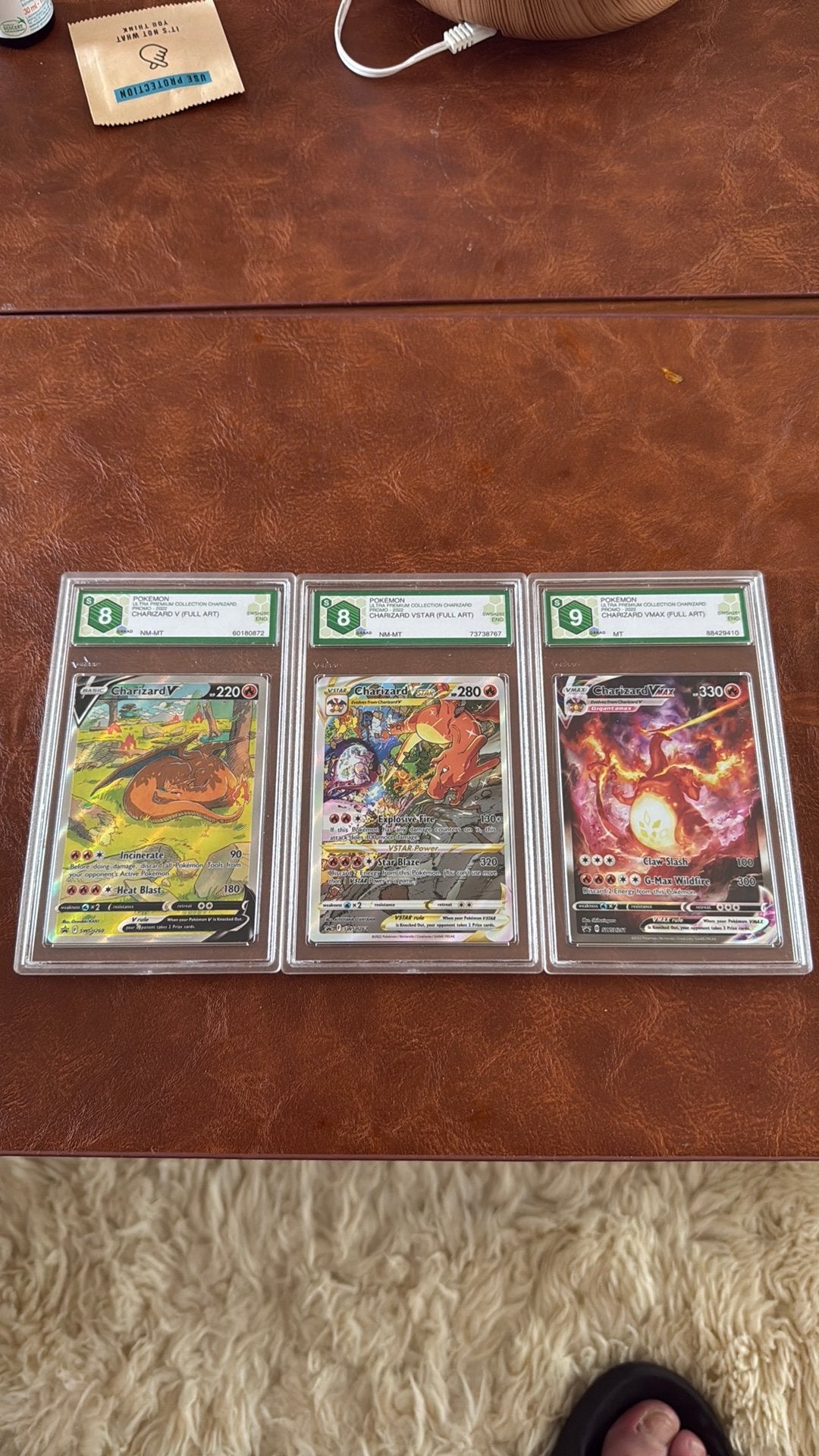 Charizard Ultra Premium Collection – SGC Graded Set, Hobby & Loisirs créatifs, Jeux de cartes à collectionner | Pokémon, Comme neuf