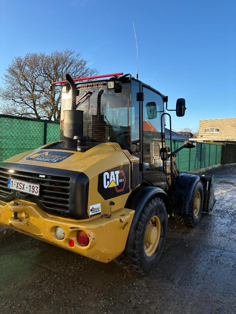Cat 906 h wiellader kniklader, Ophalen