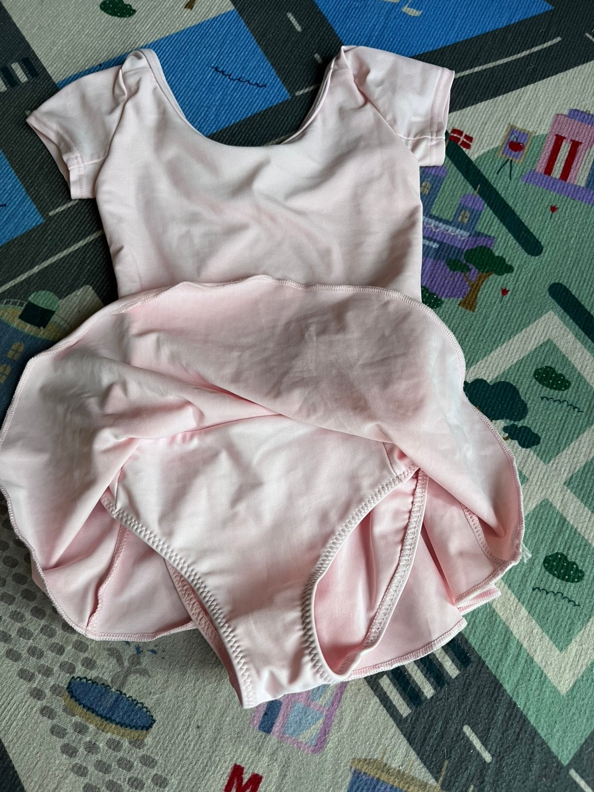 Roze ballet tenue, Ophalen