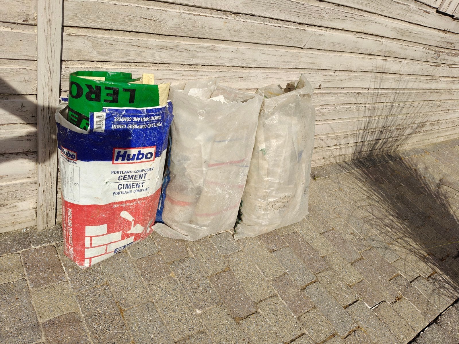 Gratis lege zakjes van zand of cement..., Ophalen
