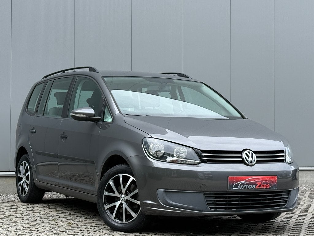 Volkswagen Touran 1.6 TDi DSG 5-Zit Cruise ParkSensor Navi, Euro 5, 4 cilinders, https://public.car-pass.be/vhr/adab7903-5ffa-4908-8a97-eaa36eb2c4c2