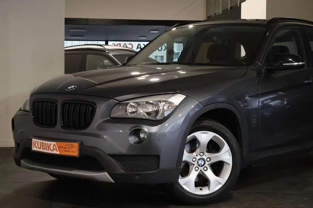 BMW X1 sDrive18i Aut. TrekH Navi CruiseC Leder Garantie*, Parkeersensor, 4 cilinders, 136 pk, Bedrijf
