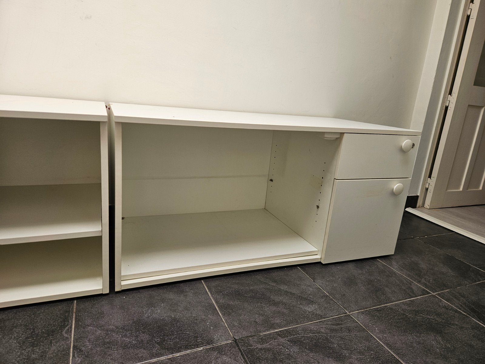 Bureaulade met kast, Ophalen