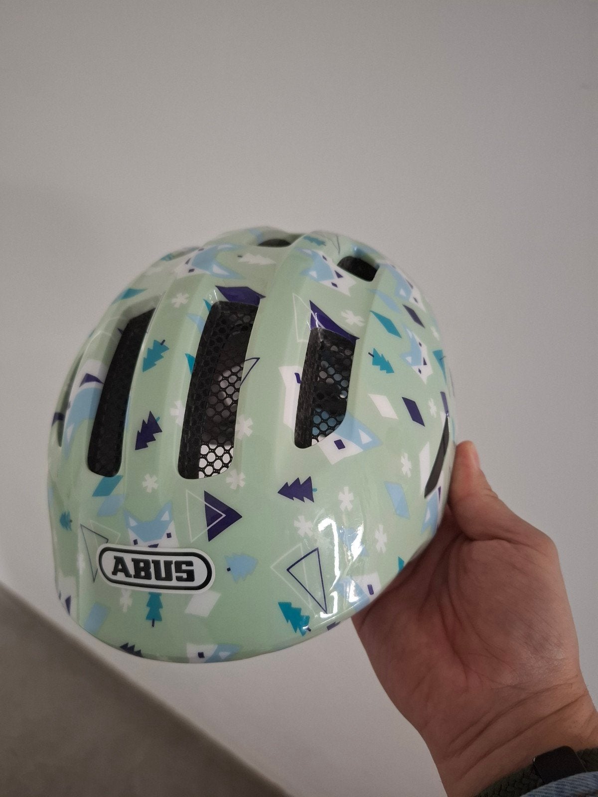 Helm albus groen kind, Ophalen