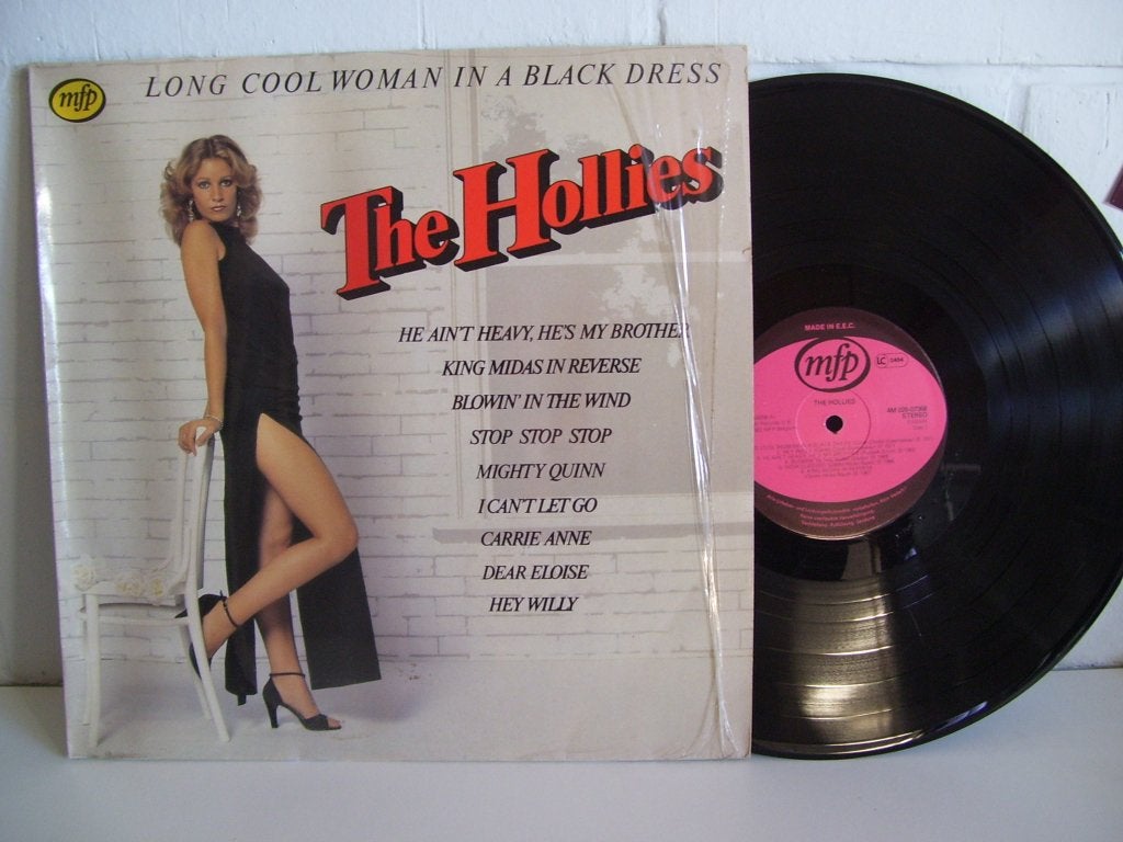 THE HOLLIES  long cool woman in a black dress, CD & DVD, Vinyles | Rock, Pop rock, Comme neuf, Housse de protection extérieure