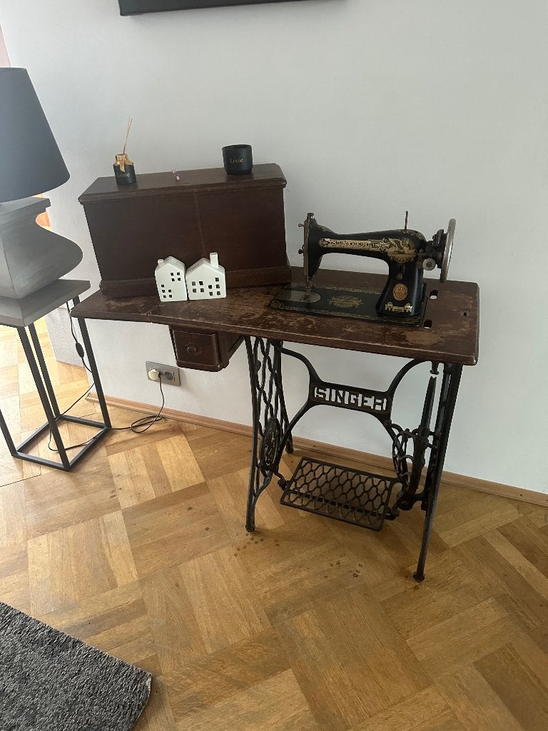 Antieke Singer Naaimachine, Ophalen