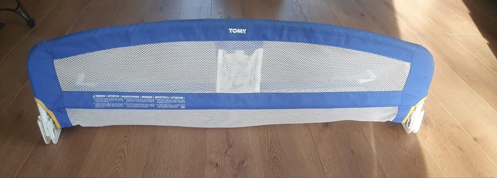 Tringle de lit Tomy bleue, Enlèvement