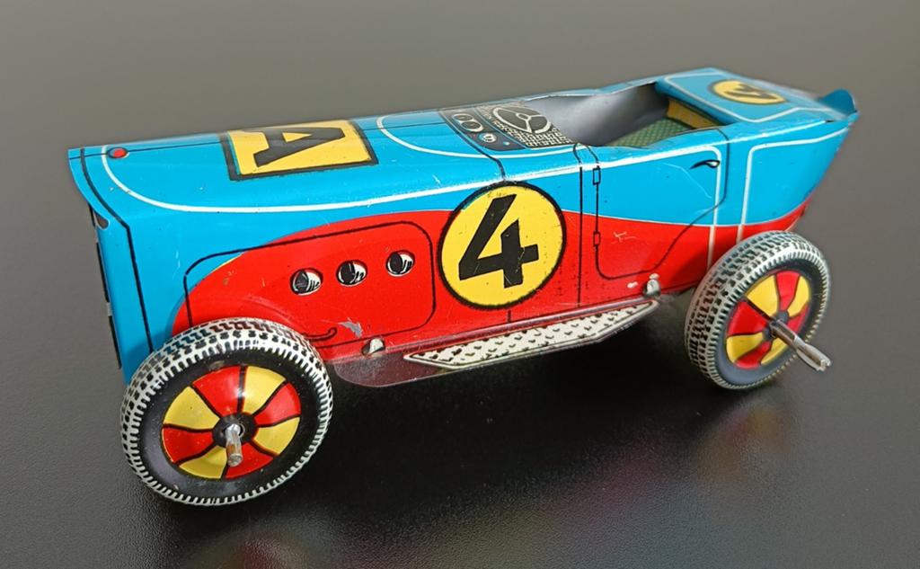 Vintage Turkse blikken raceauto Ufuk Bugatti nr.4., Antiek en Kunst, Antiek | Speelgoed, Ophalen of Verzenden