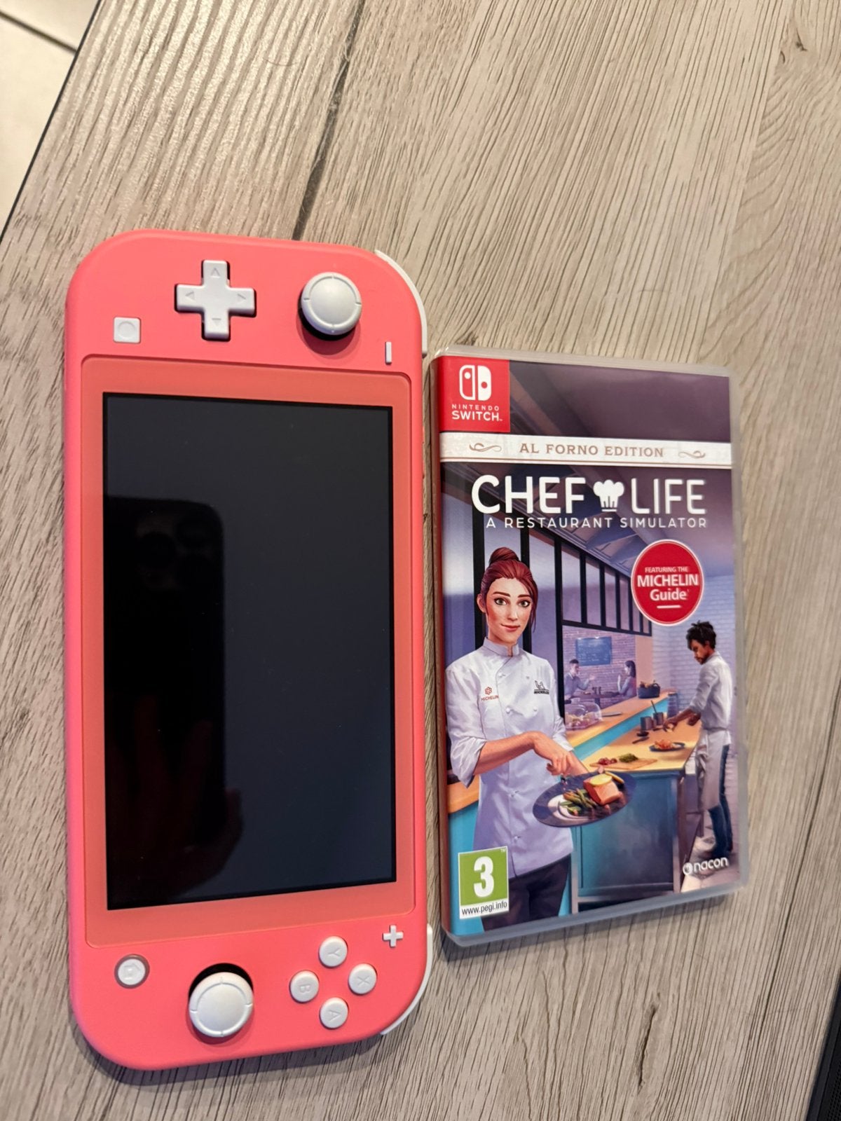 Nintendo Switch Lite + Game, Ophalen, Roze of Coral, Nieuw