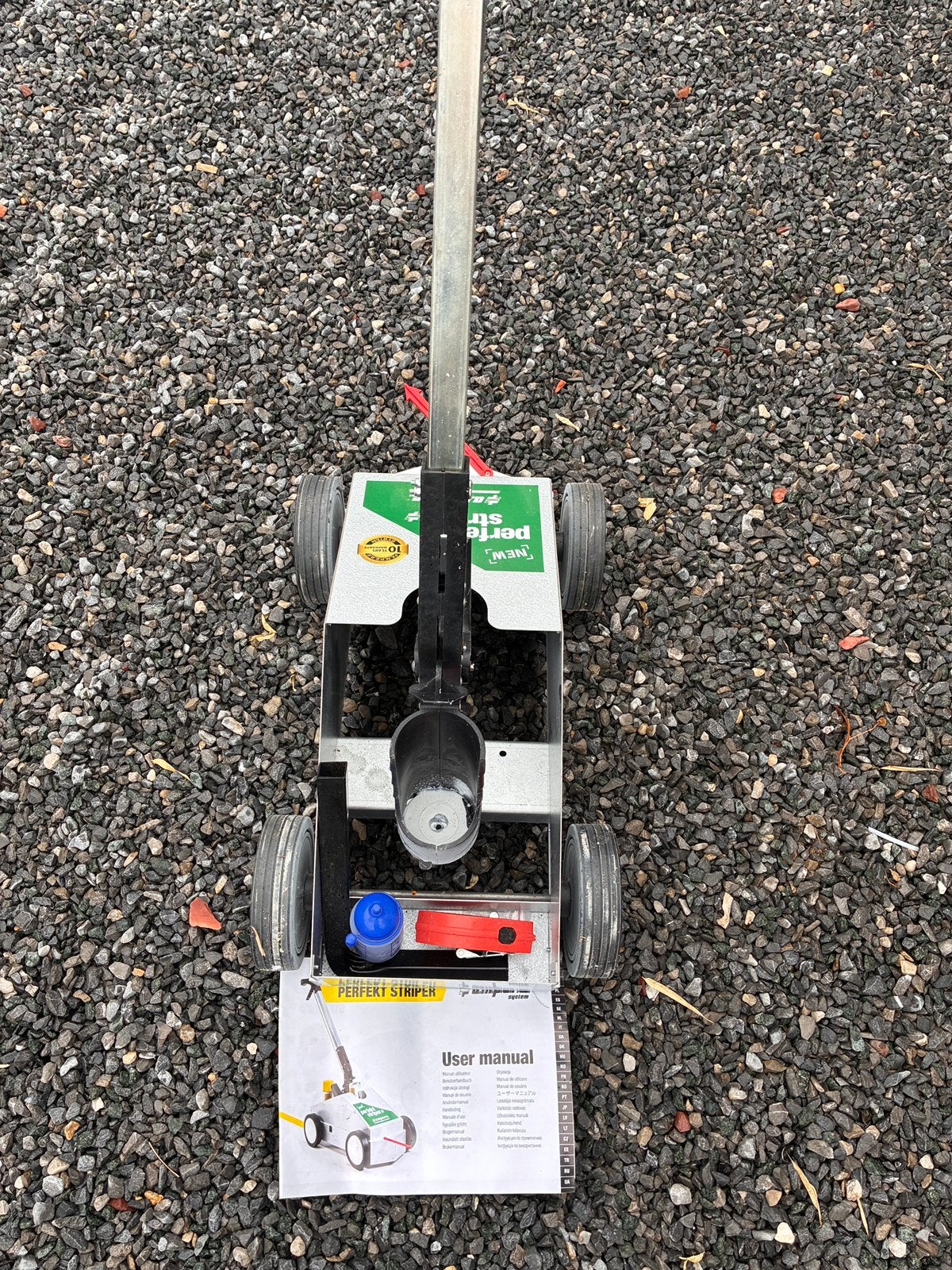 Handige tool om lijnen te spuiten. Ondergrondse parking, Ophalen