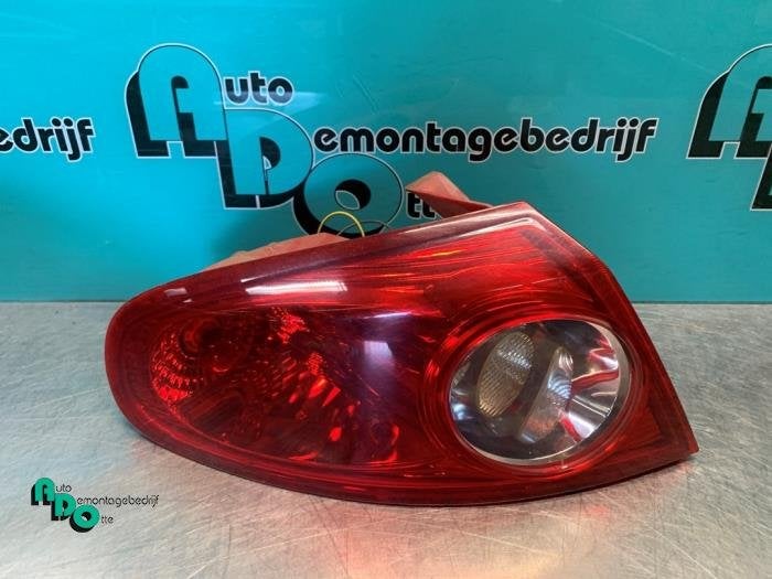 Feu arrière gauche d'un Chevrolet Lacetti (Lacetti 03-), -, 3 mois de garantie, Utilisé, -