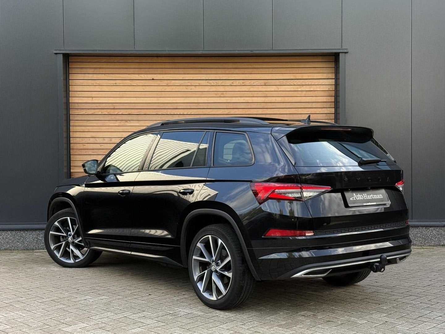 Skoda Kodiaq 1.5 TSI Sportline Business SPORTSTOELEN|TREKHAA, Auto's, Automaat, 164 g/km, Zwart, Bedrijf