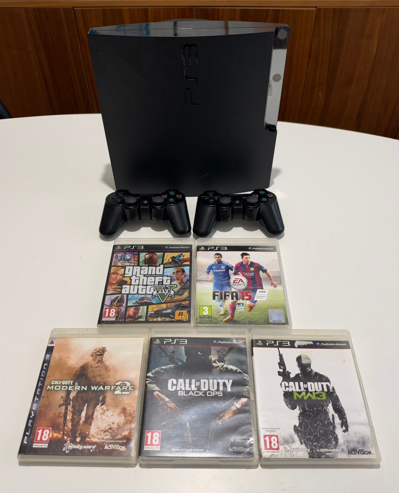 Playstation 3 slim + 2 controllers + 5 games, Games en Spelcomputers, Ophalen of Verzenden, Zo goed als nieuw, Slim