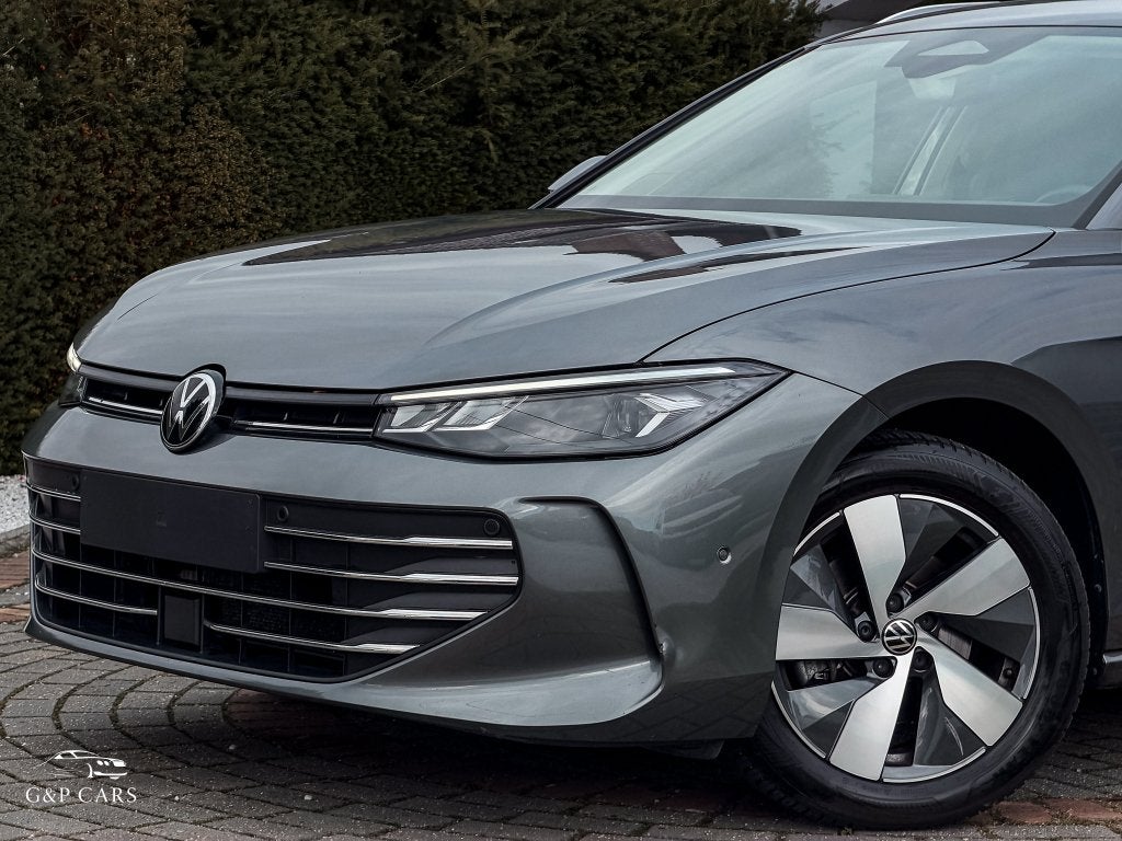 VW Passat Variant eTSI DSG | Massage | ACC | Navi | Camera, Auto's, 1498 cc, 4 cilinders, Verwarmde buitenspiegels, Bedrijf