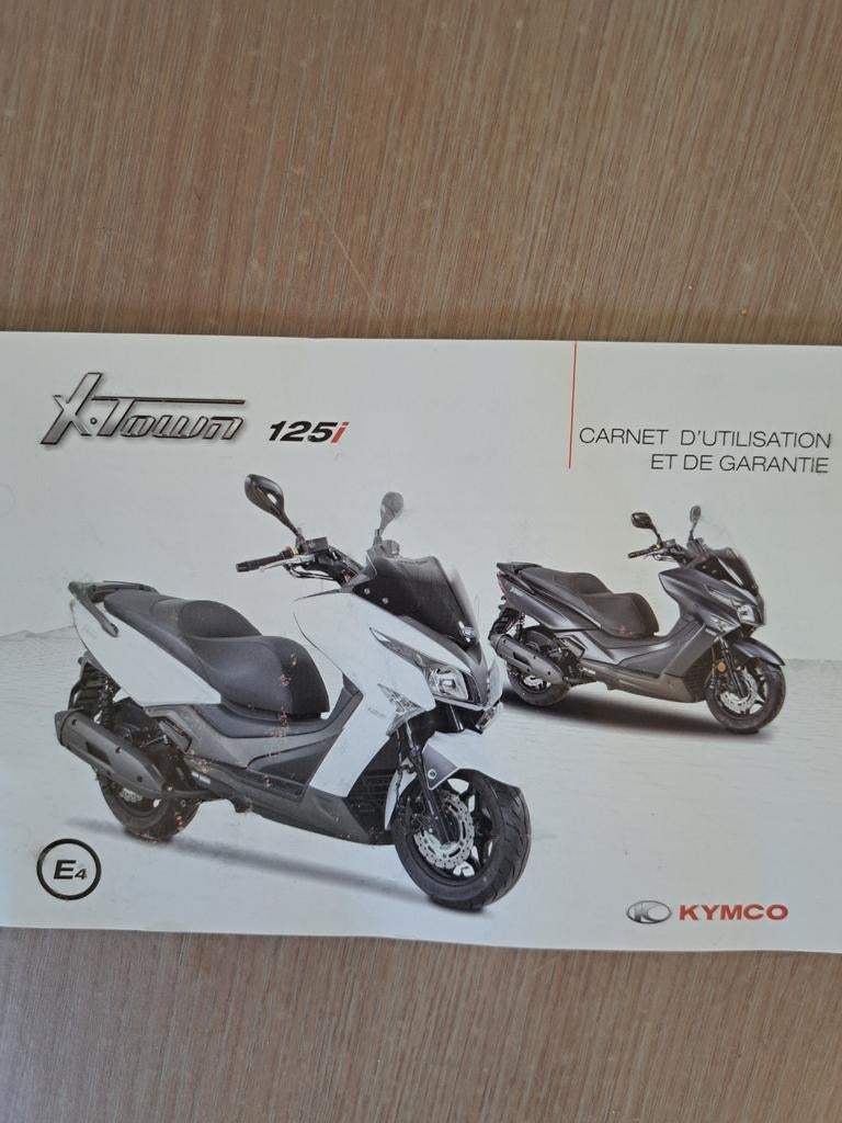 Donkerblauw  kymco x town 125 i, Particulier