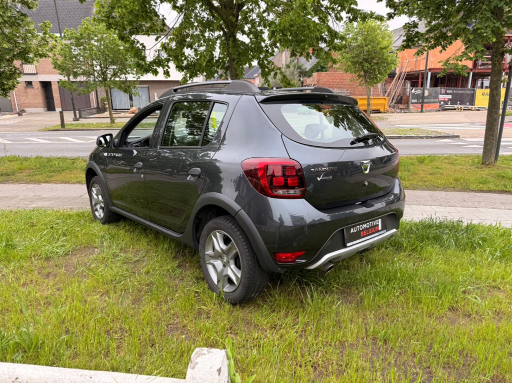 Dacia Sandero Stepway 2018 Benzine 59.000km Airco Navi, Stof, Zwart, Zwart, Bedrijf