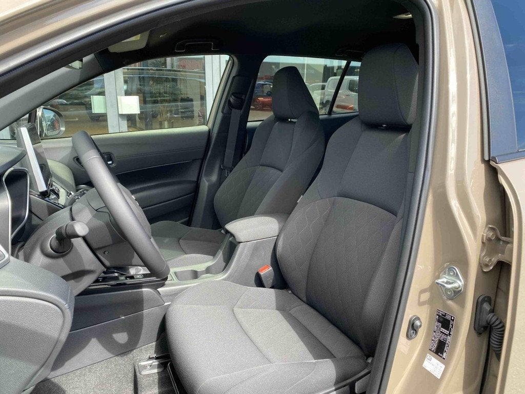Toyota Corolla Cross 1.8 Hybrid Style | Achteruitrijcamera |, Auto's, Stof, Gebruikt, 750 kg, 4 cilinders