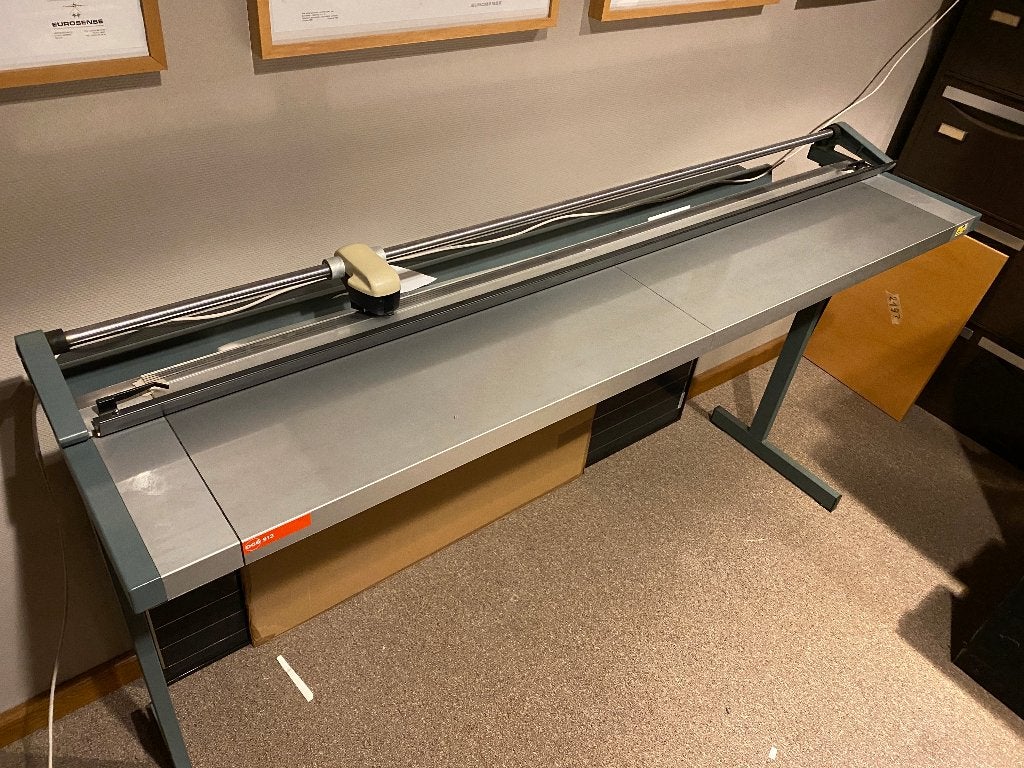 Océ 913  snijmachine, Ophalen
