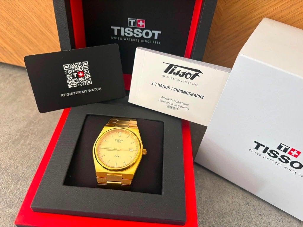 Tissot PRX 40 mm - Doré - neuf, Bijoux, Sacs & Beauté, Autres marques, Enlèvement ou Envoi, Acier, Acier