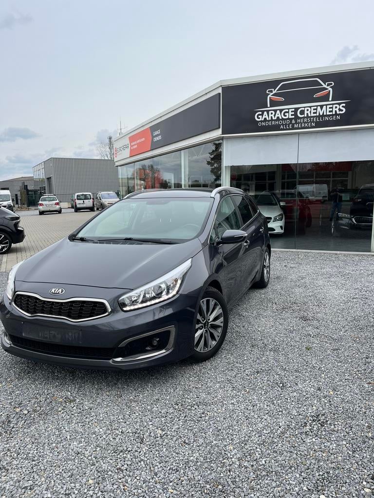 1 jaar garantie Kia Cee d 1.400cc Benzine Euro 6b, Voorwielaandrijving, 4 cilinders, Leder en Stof, Bedrijf