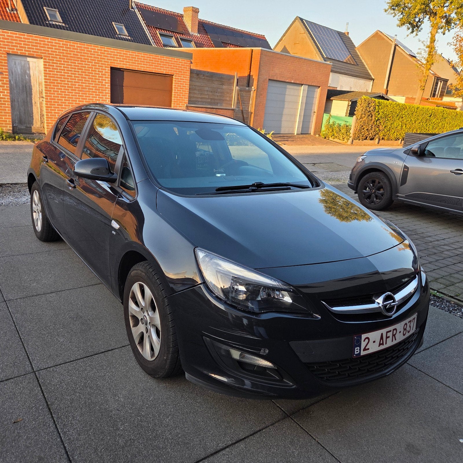 Opel Astra J 2015, Auto's, Voorwielaandrijving, Leder en Stof, Zwart, Particulier