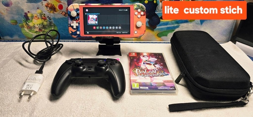 console switch lite /cust.stich+ game+controller en garantie, Ophalen of Verzenden, Zo goed als nieuw