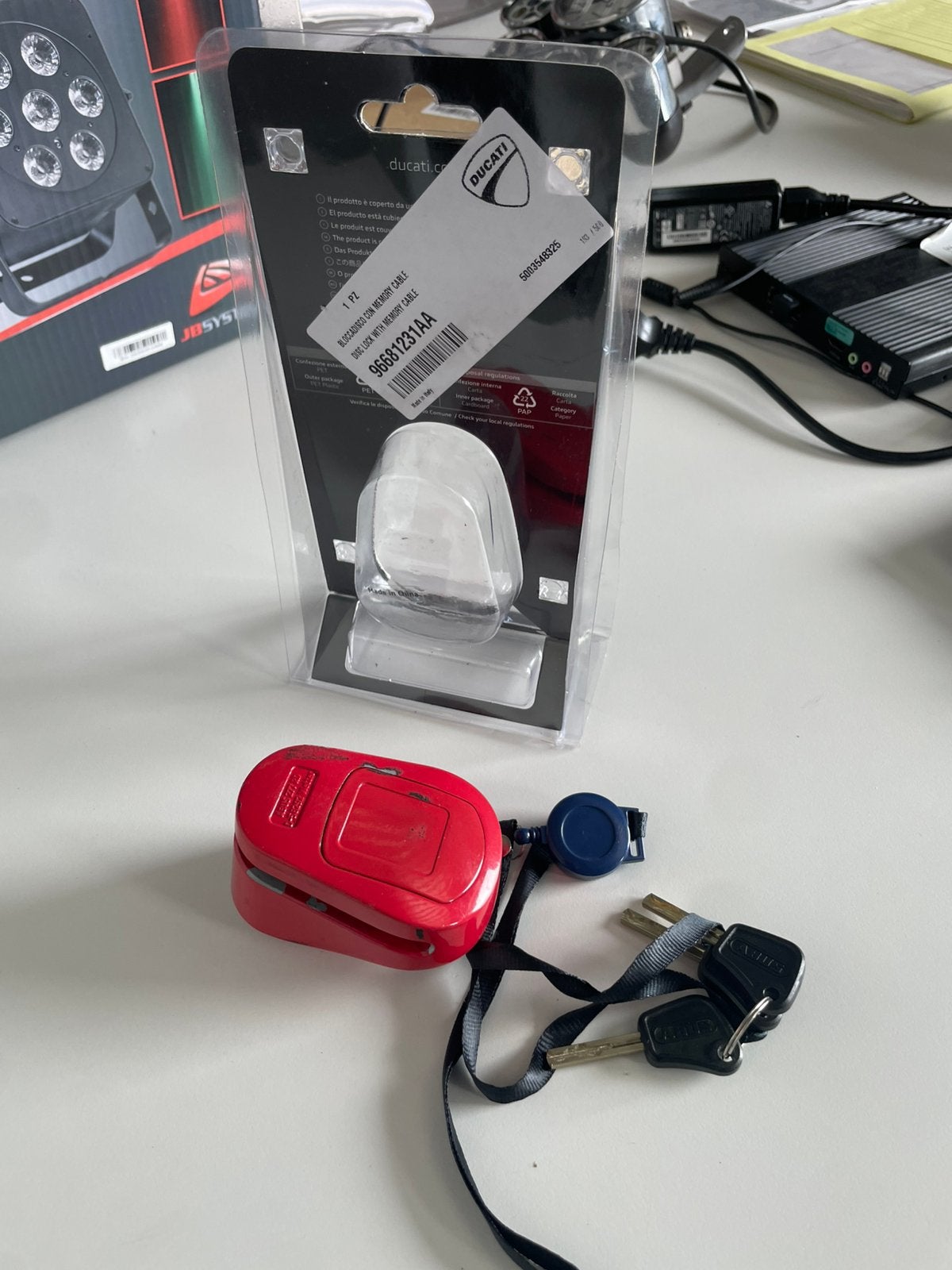 Ducati origineel schijfremslot ABUS, Motoren, Ophalen of Verzenden, Gebruikt