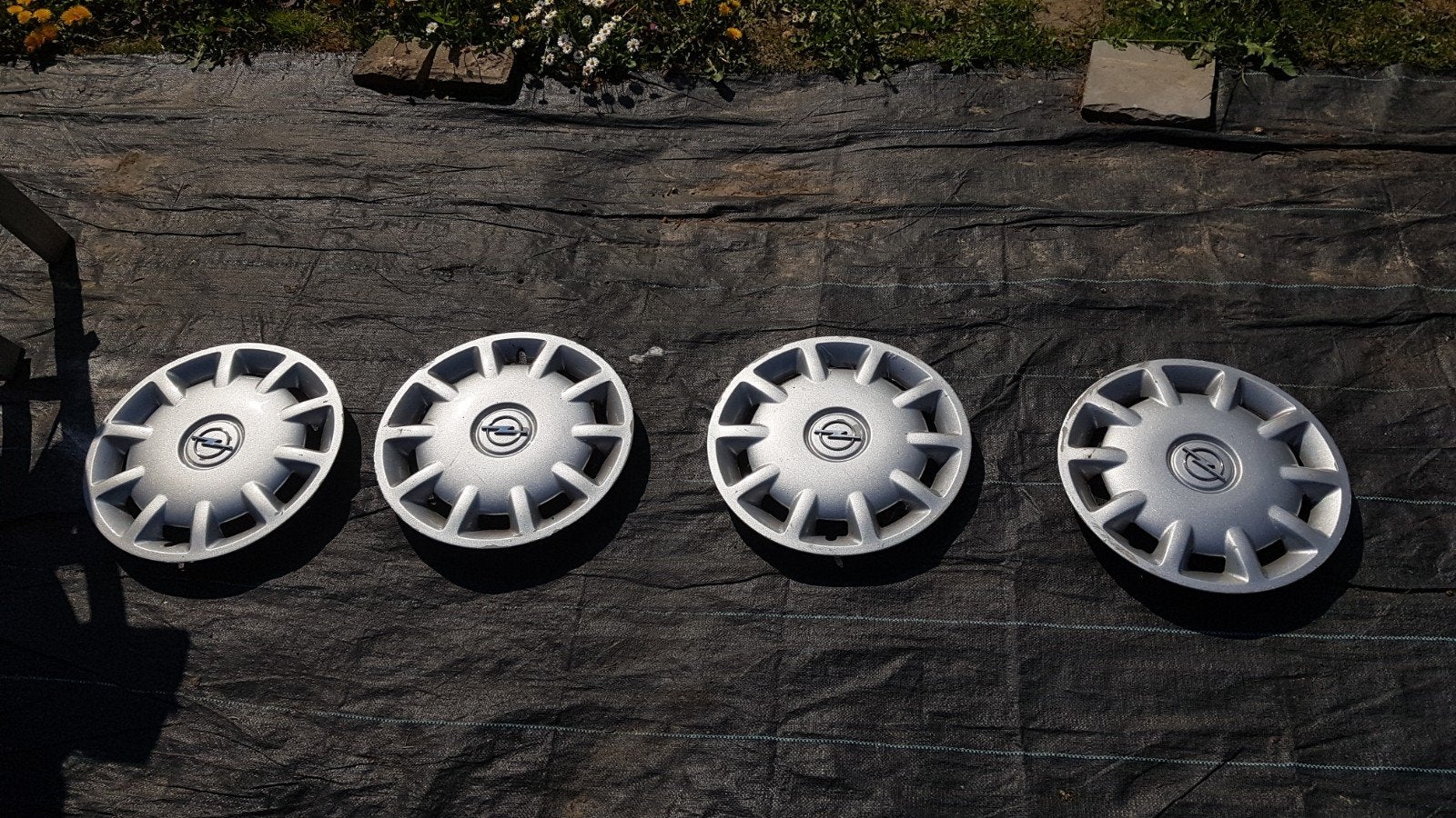 enjoliveur opel astra g, Ophalen